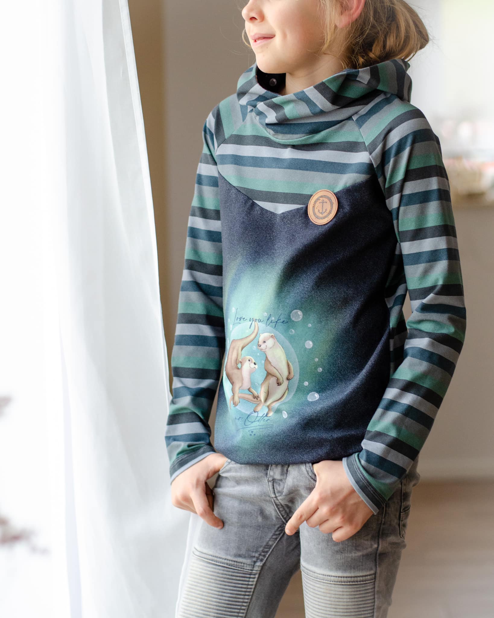 0,5m Bio-Jersey "Love you like no Otter" Streifen-Kombi schwarzgrau