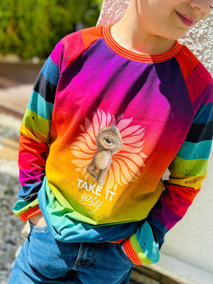Bio-Jersey Hugo das Faultier &quot;Take it easy&quot; rainbow 
